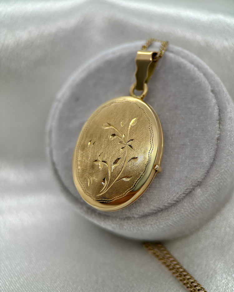 Medaljong i 18K Guld