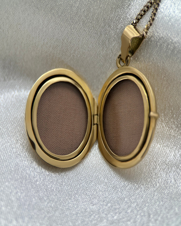 Medaljong i 18K Guld