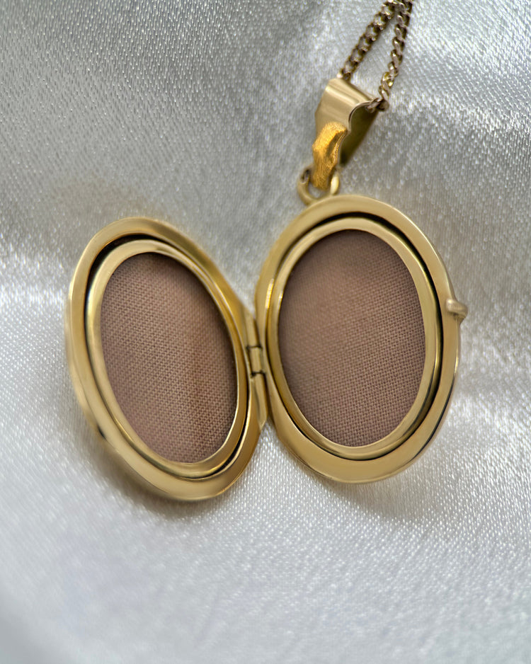 Medaljong i 18K Guld