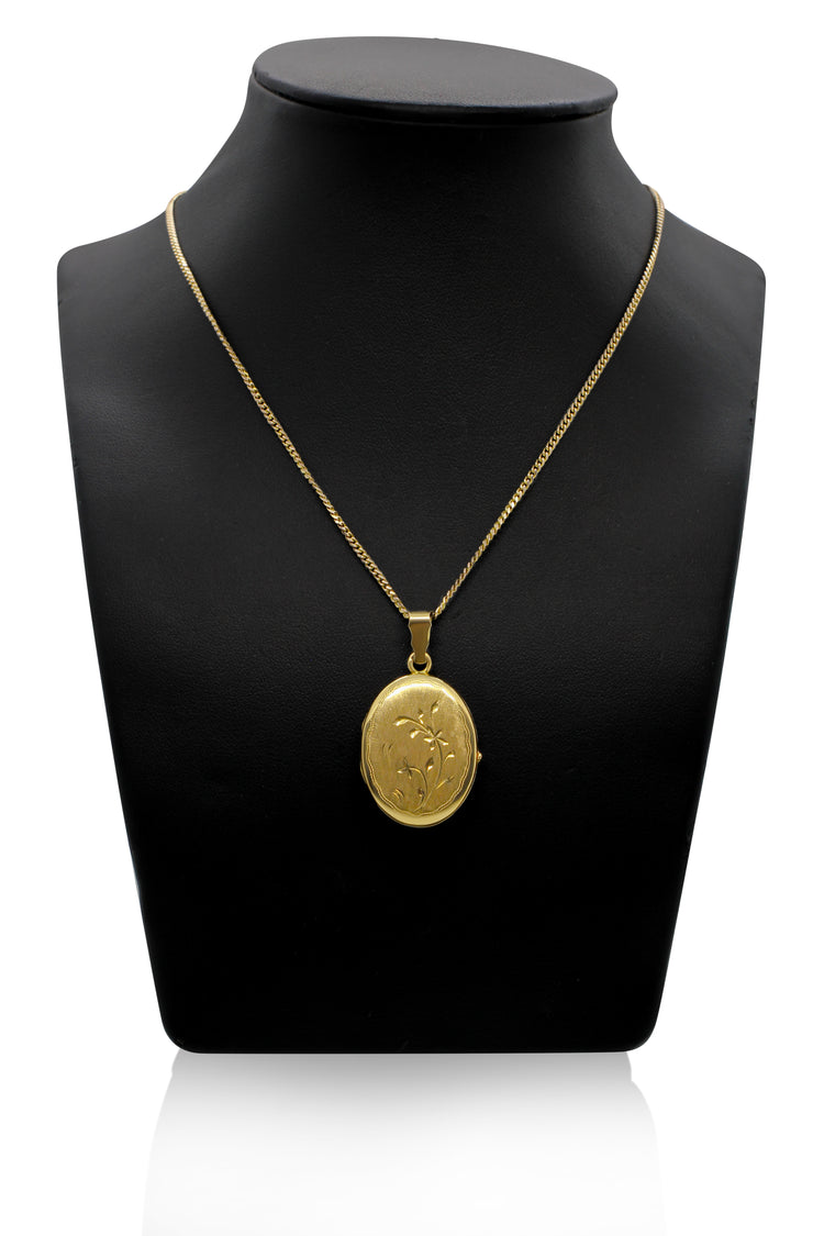 Medaljong i 18K Guld