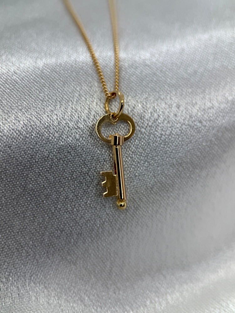 18K Nyckelformad hänge – 2.2 cm