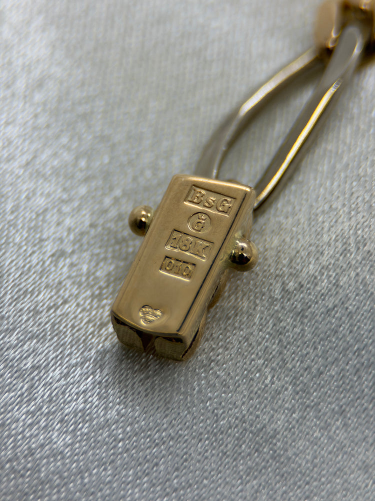 18K Figaro armband i röd- och vitguld – 23.2g, 19 cm