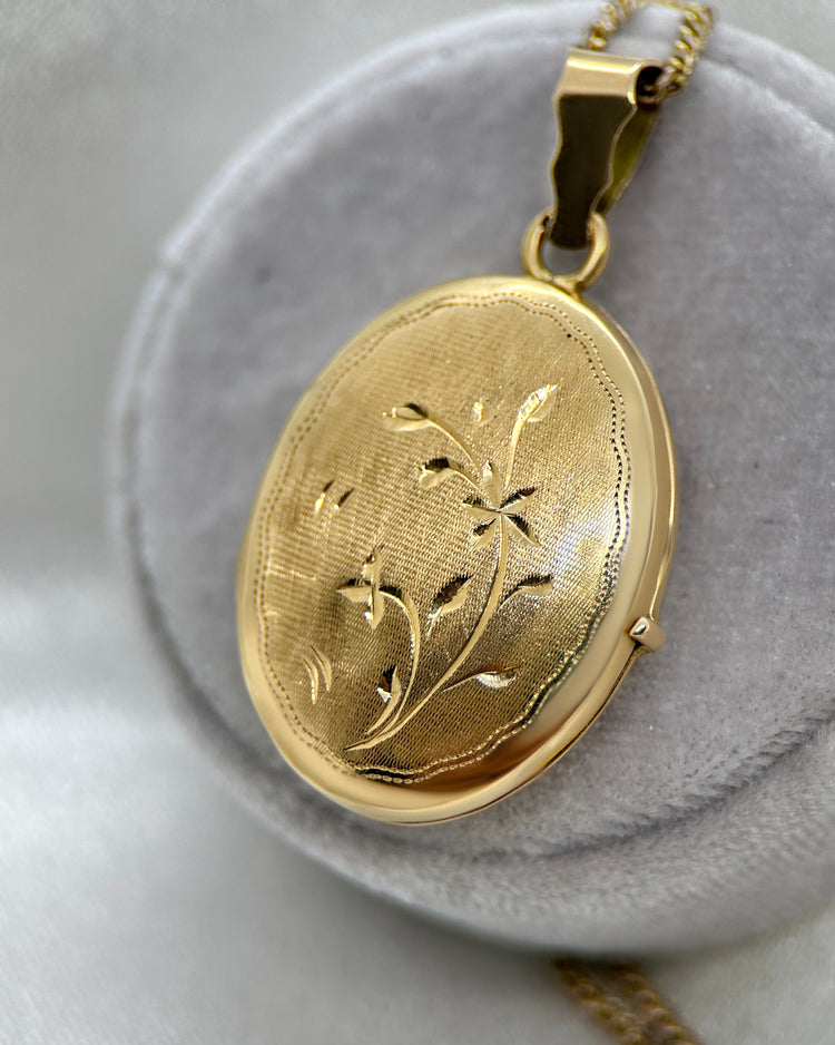 Medaljong i 18K Guld