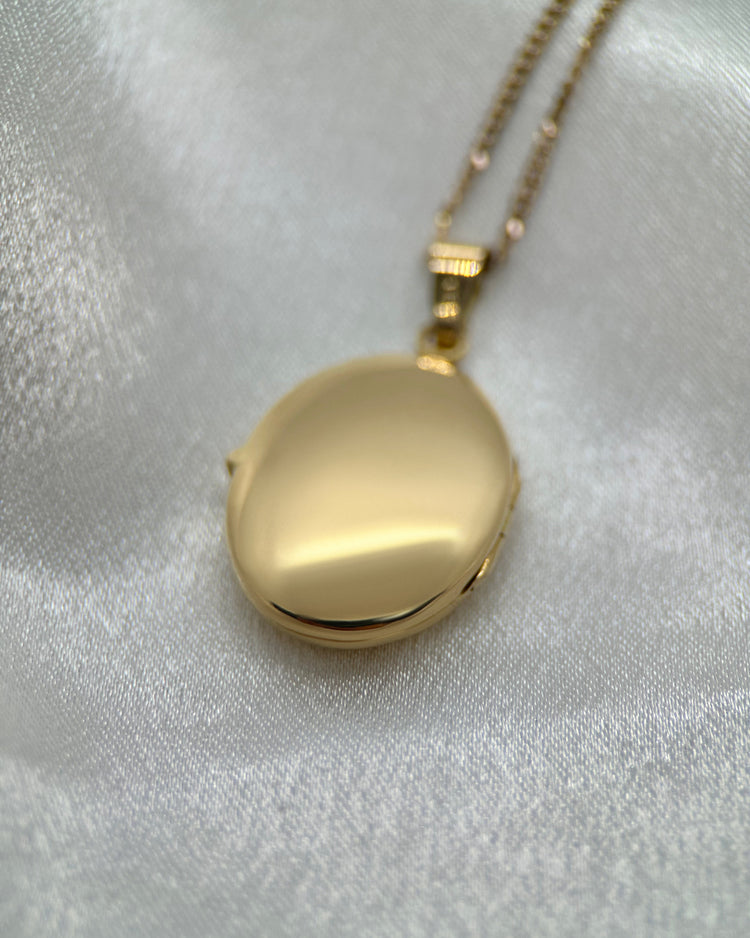 Medaljong i 18K Guld